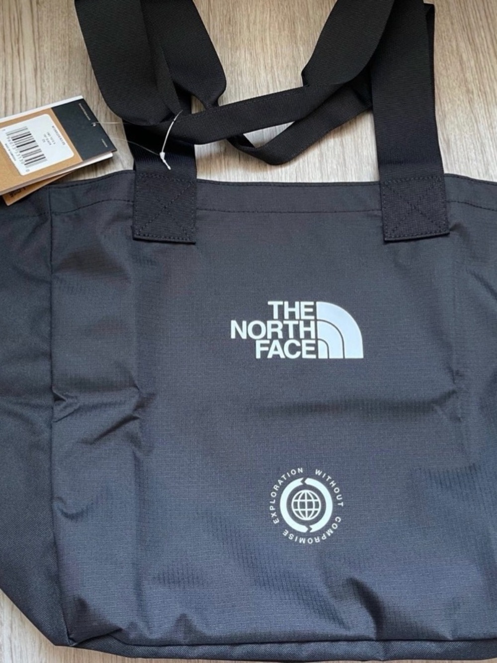 The North Face EWC SmallTote Bag. New, with tags.  100% Polyester. Color- Black